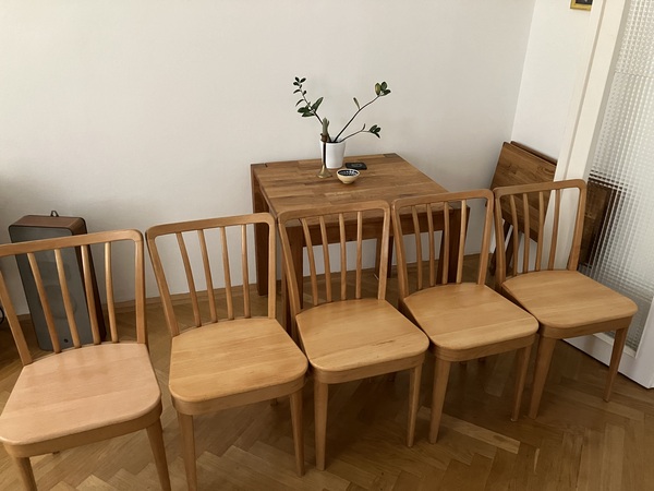 The restored chairs, with the table where they’re used. Note the different poly-based finish on the left; the rest are finished with Hartöl